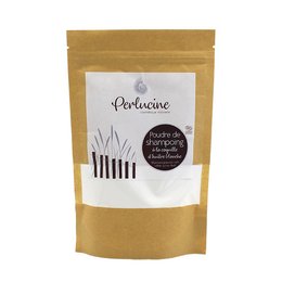 Shampoo powder refill in a brown paper bag. Eco-friendly, natural ingredients for a gentle cleanse.