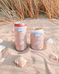 Beach-themed drink sleeve, seashell design, sand and shells pattern, insulated can holder.