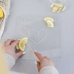 Glass cutting board with heart