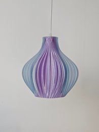 Elegant purple and blue striped ceiling light with a unique, bulbous shape and a warm, glowing interior.