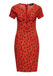 A red knee-length dress with a floral cherry and rose print pattern. The dress has a v-neck and short sleeves.