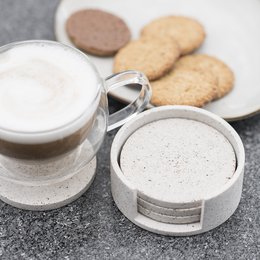 Beige ceramic coaster set with holder, includes 4 coasters and 1 holder, suitable for coffee cups and mugs.
