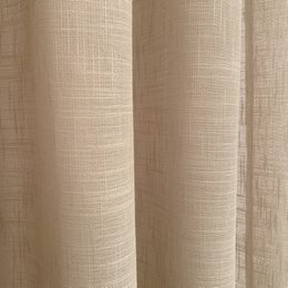 Translucent curtain made in eyelets. Quality curtains made with recycled materials. Linen color. Curtains for living room, bedroom and kitchen.