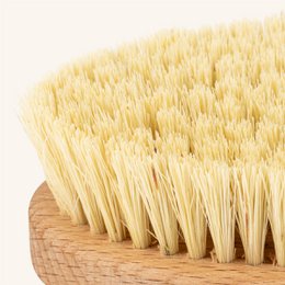 Ripasso a secco vegano in legno per lavarti la pelle