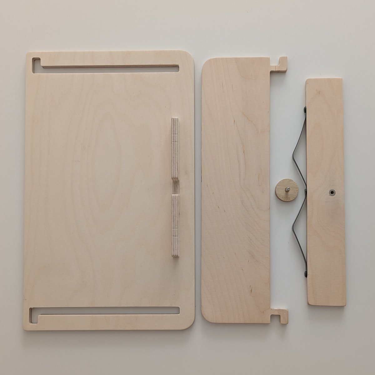 Adjustable support for books and tablets - The reader