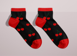 Black ankle socks with red hearts, suitable for women's casual or formal wear.