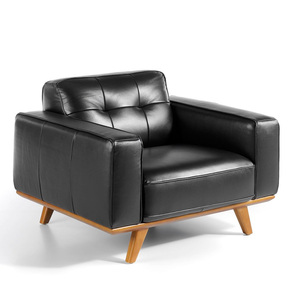 Armchair upholstered in leather and Walnut wood legs