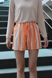  Cheerful printed shorts in a variety of vibrant colors including khaki green, black and white, purple, light blue, old pink, ice blue, orange, fuchsia, dark green, and coral.
