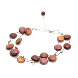 Double Tagua Bracelet - Charm bracelet made of natural tagua nuts in various shades of brown and orange.