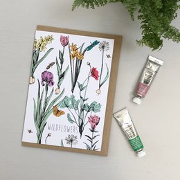 Flores prensadas tarjeta de felicitación dibujada a mano
