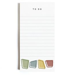 Notepad with squares design, available in various colors.