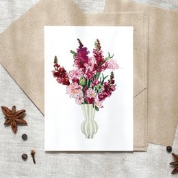 A colorful birthday postcard featuring a cupcake illustration with a festive design.