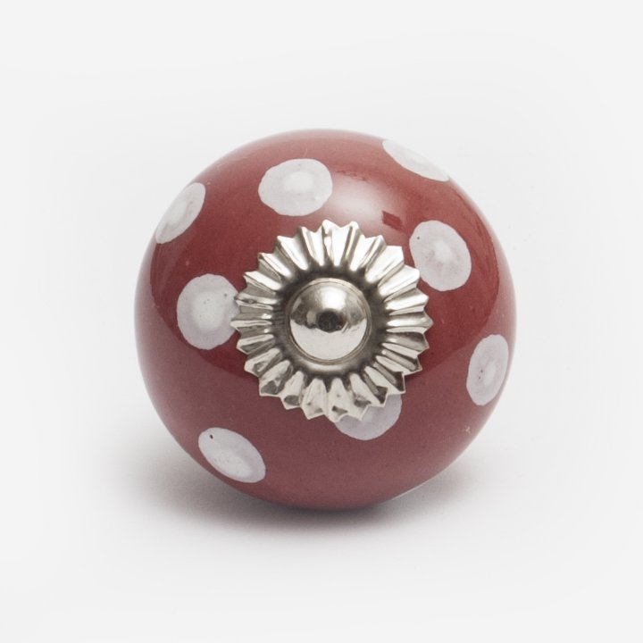 Rode keramische knop met witte stippen