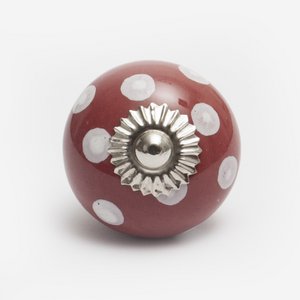 Rode keramische knop met witte stippen