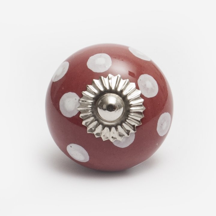 Rode keramische knop met witte stippen