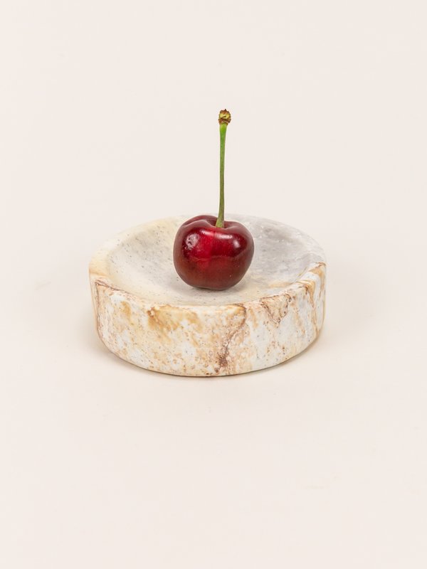 Small wide round box in stone with natural stone lid