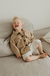 Oversized beige corduroy jacket for babies, featuring a classic button-up design and roomy fit. Suitable for ages 1-6 years.