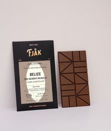 Dark chocolate bar with 70% cacao from Belize, featuring a trio of reserve microlots. Rectangular shape with geometric pattern on the packaging.