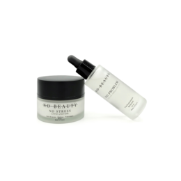 A duo set of a cream and a serum product. The cream is a moisturizing and nourishing formula, while the serum provides a boost of hydration and radiance.