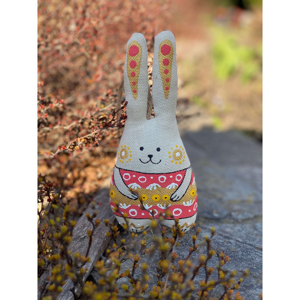 Bunny with a pink-gold ornament