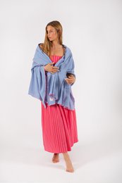 Lightweight oversized scarf, available in multiple colors including lavender, ocean, rose, and black. Versatile wrap style.