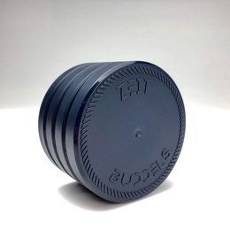 Dark blue travel bottle lid with ridged texture and embossed text.