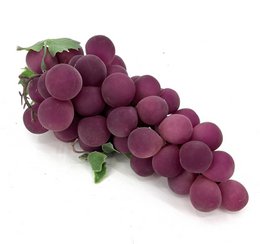 Purple grapes bunch, artificial fruit, dark red round berries, green leaves, decorative.
