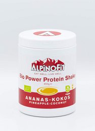 Pineapple coconut flavored protein shake powder in a white container with red and white branding. The powder is designed to provide a nutritious protein boost.