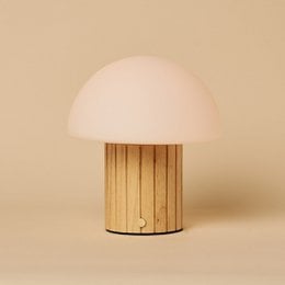 Light brown mushroom dome table lamp, wooden base, dimmable, rechargeable, warm light colors, modern minimalist design.