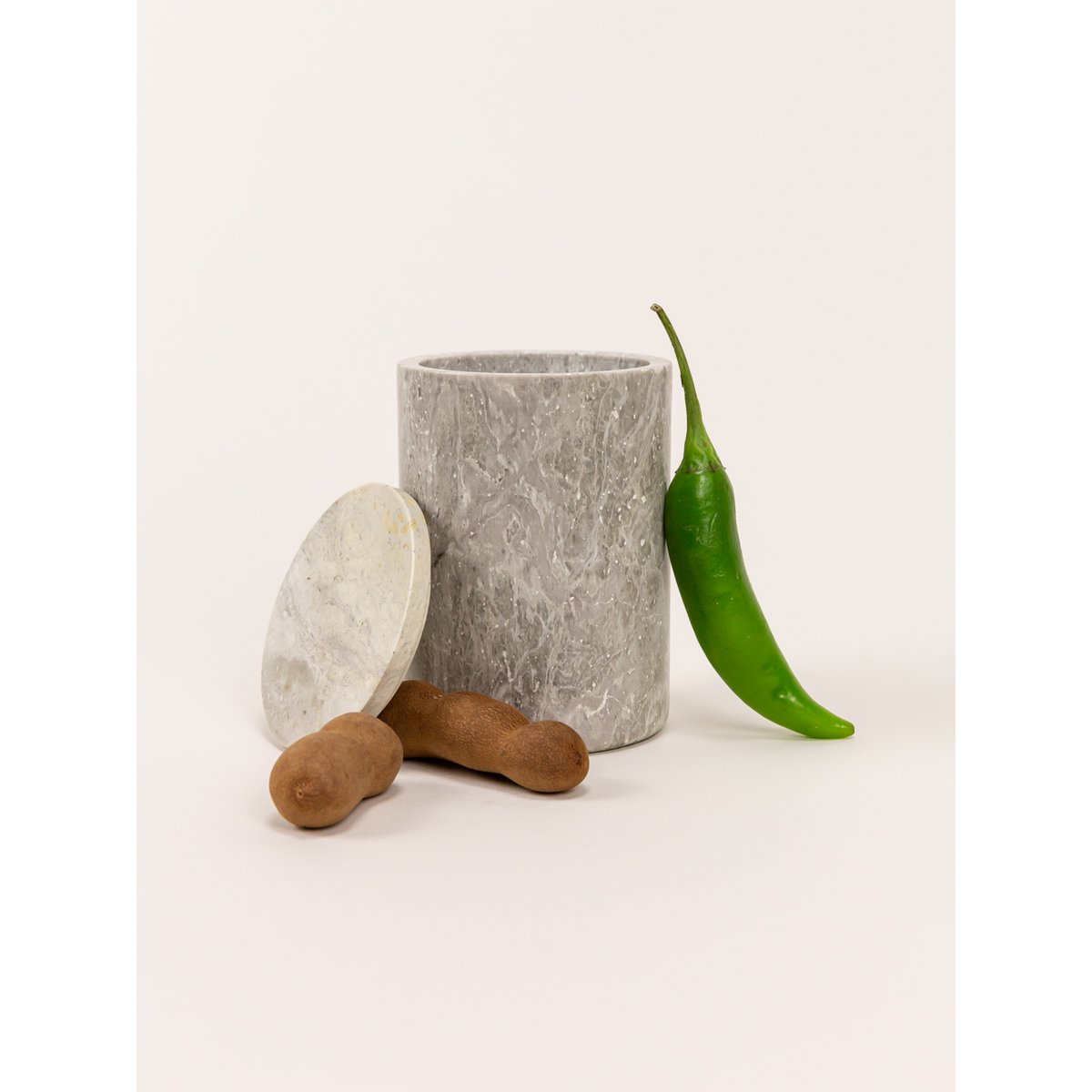 Medium cylindrical box in stone with natural stone lid