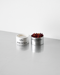 Botanical rose petals in a silver tin container, perfect for mocktails or cocktails.