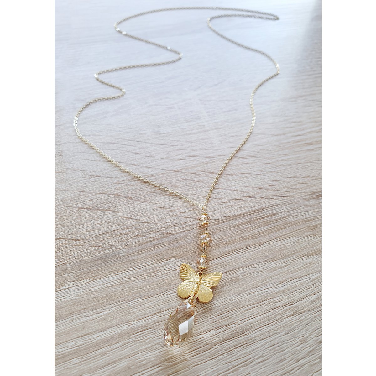 Long 18K gold plated butterfly necklace with Golden Shadow crystals