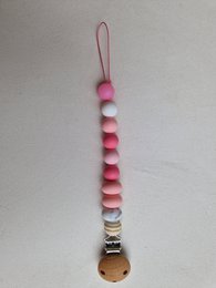 Pacifier clip with glow-in-the-dark pink beads and metal ring for attaching to pacifier.