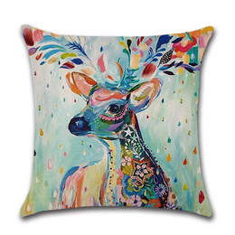 Colorful deer-themed cushion cover with abstract, vibrant design featuring a deer with antlers in a variety of colors and patterns.