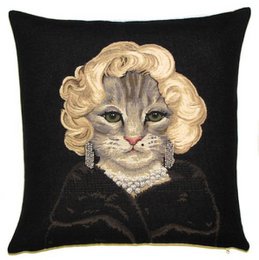 Decorative pillow cover featuring a cat with a Marilyn Monroe-inspired hairstyle and jewelry. The cat has a playful, glamorous expression against a black background.
