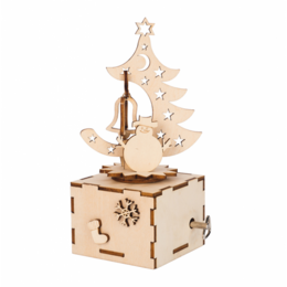 A wooden Christmas music box with a tree-shaped design featuring cutout stars and a rotating center piece. The box has a natural, rustic appearance.