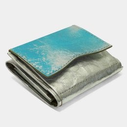 Minimal wallet made of paper in silver sky color. Compact and stylish design suitable for everyday use.
