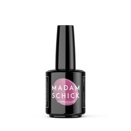 A 15 ml bottle of Madam Schick hybrid nail polish in color #23A023. The polish has a glossy, vibrant pink color.