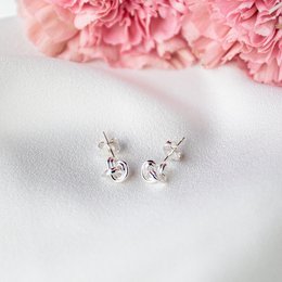 Silver hoop earrings with a delicate, minimalist design.