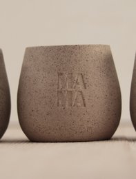 Stoneware MAMA mug, a rustic ceramic mug with the text "MAMA" embossed on the surface, suitable for hot beverages.