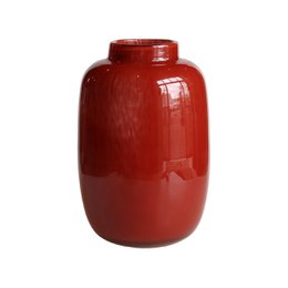 Red ceramic vase, glossy finish, rounded barrel shape, decorative home accent.