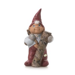 A decorative standing gnome figure with a red hat, gray beard, and holding a wooden log.