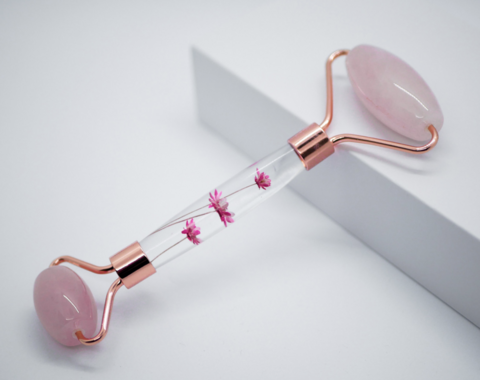 Rose quartz roller with flower handle