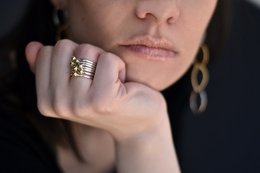 Silver stackable bubble ring set with multiple rings in various sizes.