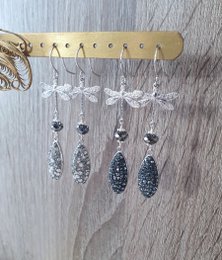 Rhodium plated dragonfly earrings with grey crystal drops