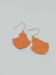 Orange enamel drop earrings with a cat-shaped design.