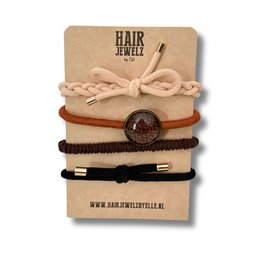 Colourband "Caramel Crush" - Kids Hair Ties. Includes a set of hair accessories in warm, earthy tones like caramel, brown, and pink. Features a variety of hair ties, scrunchies, and clips for styling children's hair.