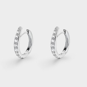 Silver pointed hoops and zircons