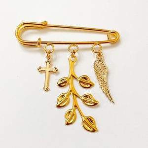 Pin lucky charm as a gift for birth or christening with 3 charms