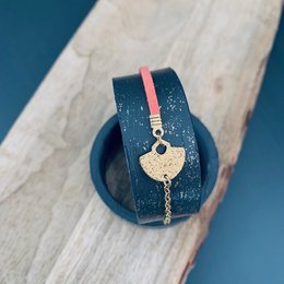 Charm bracelet with heart-shaped pendant in navy blue and pink colors.